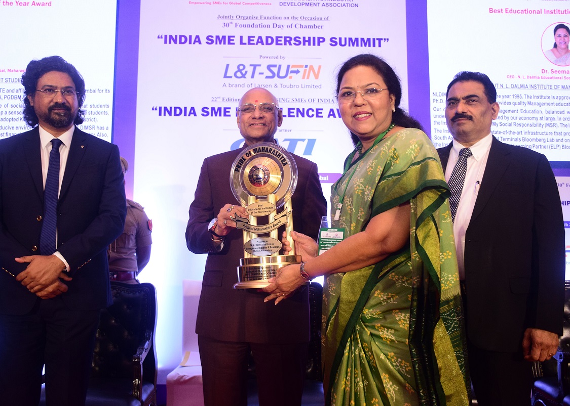 Dr. Seema Saini, CEO, N. L. Dalmia Institute of Management Studies & Research, Mumbai, Maharashtra has been conferred with the prestigious “PRIDE OF MAHARASHTRA AWARD” by Maharashtra Industry Development Association for their unique contributions in the education field and for generating new entrepreneurship and start-ups, initiated at the hands of Shri Ramesh Bais, Hon’ble Governor of Maharashtra on 25th March 2023, in picture (left to right), Shri Charles D’Costa, Chief Transformation Officer, GATI, Hon’ble Governor & Shri Chandrakant Salunkhe, Founder & President, Maharashtra Industry & Development Association & SME Chamber of India.